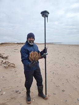 Dr. Jubin Thomas with equipment