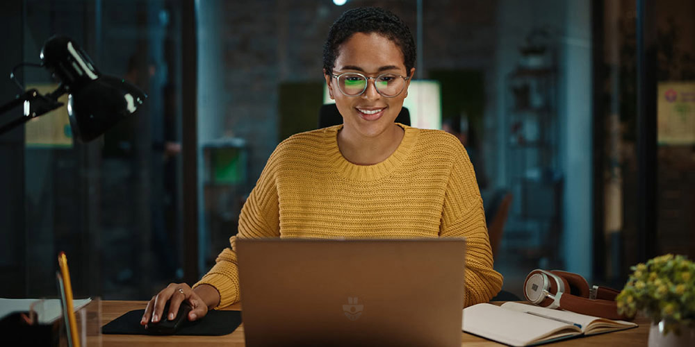 A person looking at a computer screen.